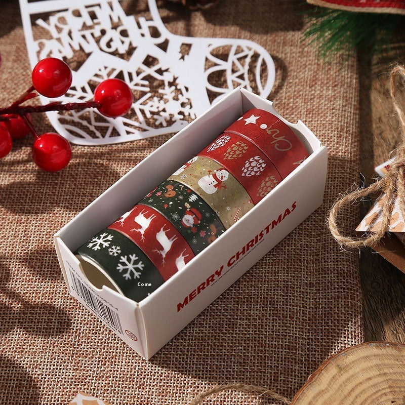 Washi -tape met kerstthema en kerstcadeau -inpaktape