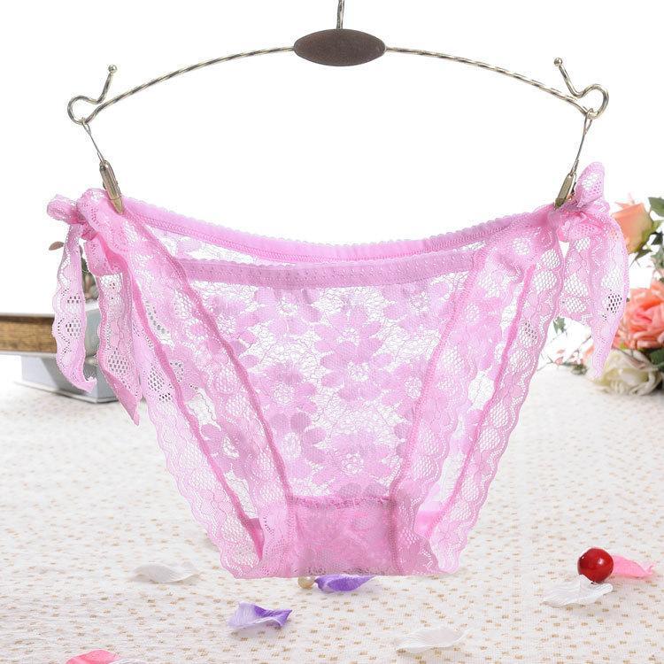 Panty de encaje transparente con lazo a la cadera