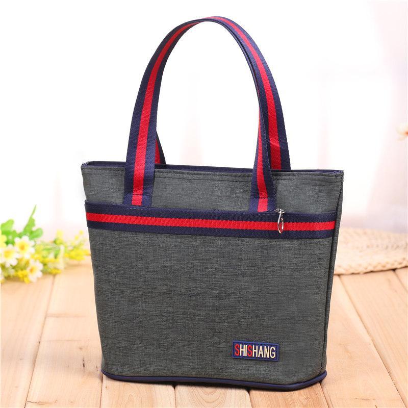 Bolso de mano tipo shopper con tiras